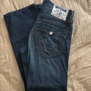 True Religion dark blue jeans with rips